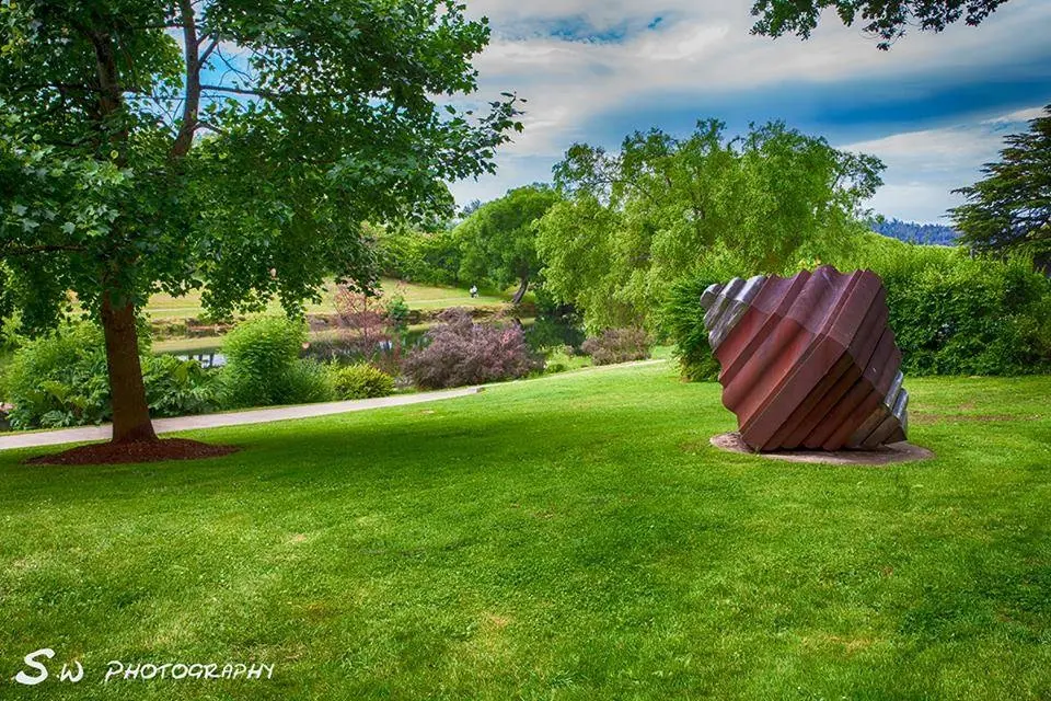 Large nut sculpture installed in landscaped grounds in Deloraine Tasmania